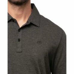TravisMathew The Zinna Mens Golf Polo -Clubs Shop THE ZINNA HEATHERBLACK 1 dde61944 fb98 4fef bcba 010f31f66900