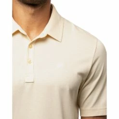 TravisMathew The Zinna Mens Golf Polo -Clubs Shop THE ZINNA HTHRBANANA 1 841273ad 10a6 4d86 a87c 127cdcb8b0fe